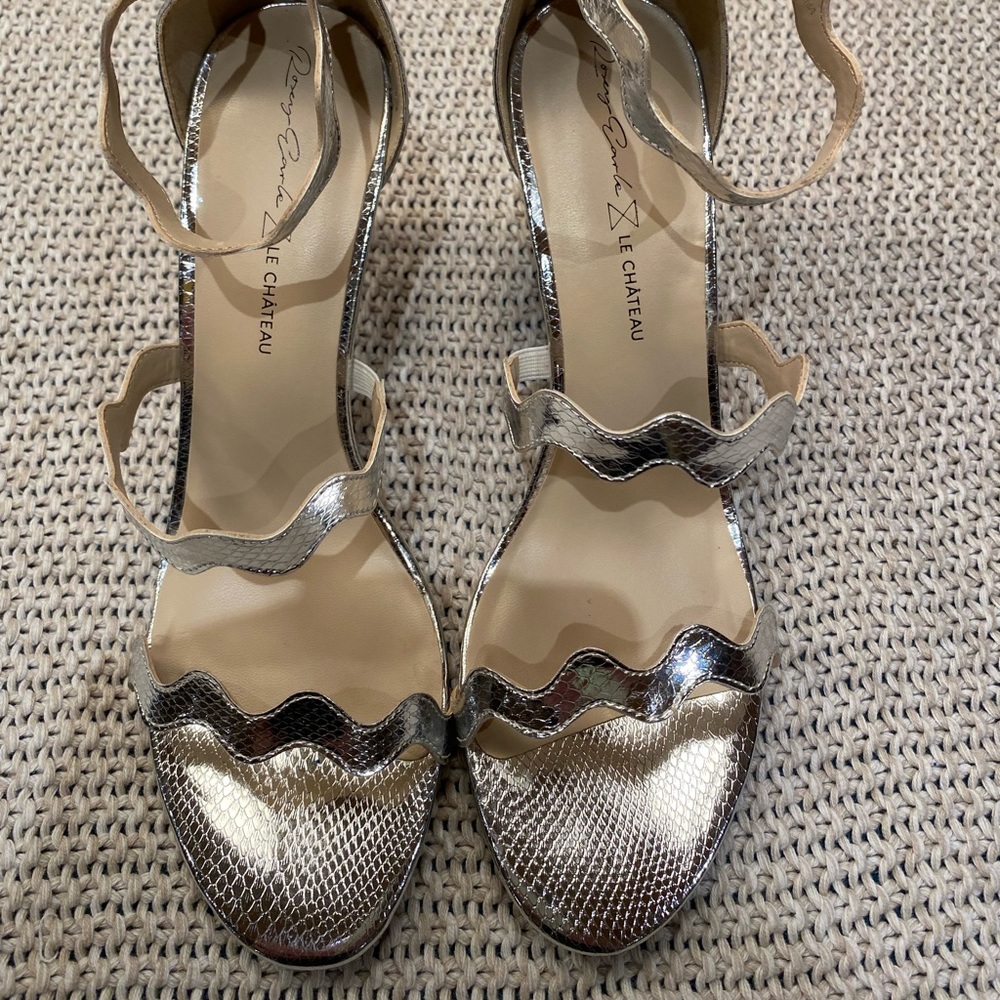 Sexy silver size 8 and 11 Roxy Earle by Le Chateau
